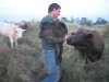 Lois watches Brian carry her baby calf