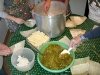 making homemade green chili and cheese tamales
