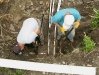 Jim and Paul install stop waste valve at new wellhouse