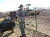 Al feeding horses workamping at New Arizona ranch