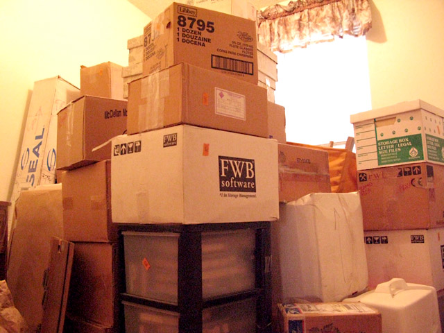 Boxes piled high in new spare room