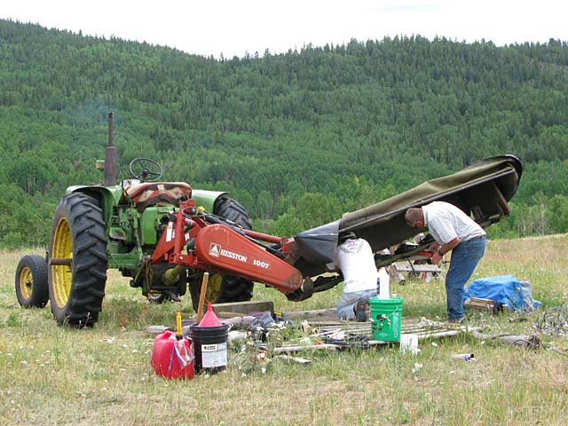 Jim helps replace blades on Vickers Ranch mower